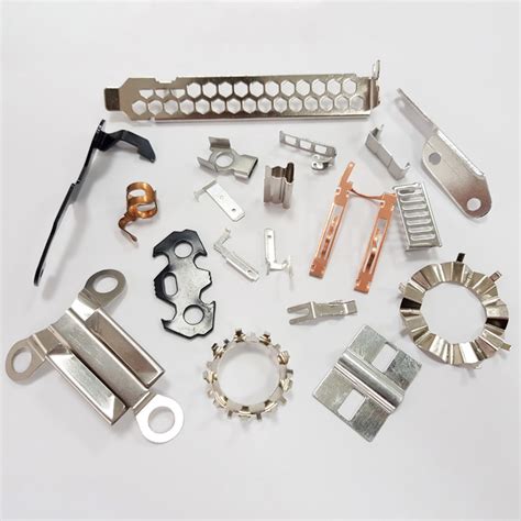 custom spring loaded metal assembly fabrication|custom metal stamping company.